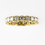 American wedding band 18 kt yellow gold set with 18 brilliants (+/- 0.05 ct). Hallmark: none. TD: