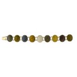 Lava stone bracelet 18 kt yellow gold, composed of 9 medallions set with lava stone cameos of