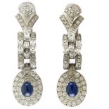 Pair of sapphire drop earrings 18 kt white gold, each set with a sapphire cabochon and small