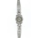 Jaeger-Lecoultre 1950-60's lady's watch 18 kt white gold, round dial, silver ground, bar index,