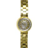 OMEGA Lady's Omega bracelet watch 18 kt yellow gold, in a case. Poids (gr) : 28