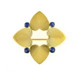 Tiffany & Co 4 heart brooch 14 kt yellow gold, depicting 4 hearts back-to-back and set with 4 blue