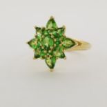 10K Gold & Peridot Star Ring. Stamped '10K' inside band. Total Weight: 1.7 dwt / 2.6 g Ring Size: