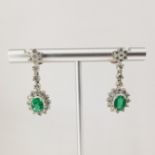 14K White Gold Emerald & Diamond Drop Earrings. Stamped '14K' on post. Length: 3 cm. Overall Weight: