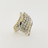 10K Gold & Diamond Cluster Ring. Stamped '10K' inside band. Ring contains a mixture of baquette