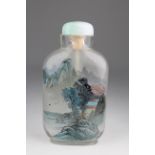 An inside-painted glass snuff bottle. 20th C. Painted predominantly in a blue tone, one side