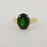 10K Gold & Synthetic Emerald Ring. Marked '10K' inside band. Total Weight: 2.1 dwt / 3.3 g Ring