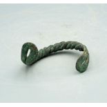 A lovely bronze bracelet from Luristan, ca. 800 - 200 BC. This beautiful braided example is 3 inches