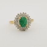 10K Gold Emerald & Diamond Ring. Stamped '10K' inside ring. Total Weight: 2.2 dwt / 3.4 g Ring Size: