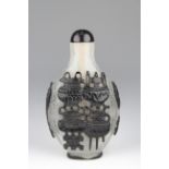 19th C. Chinese Overlay Glass Snuff Bottle. Overlay 'snow-storm" glass snuff bottle, caved nine