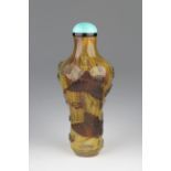 Rare 19th C. Chinese Glass Snuff Bottle. Sandwiched overlay glass bottle in petal design with