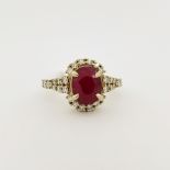 14K Gold Ruby & Diamond Ring. Stamped '14K' inside band. Ring Size: 7.75 Overall Weight: 5.3 g