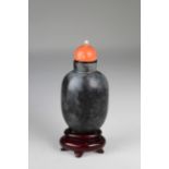 19th C. Chinese Black & Grey Jade Snuff Bottle. In elongated form, the stone of mottled grey