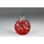 19th C. Chinese Overlay Glass Snuff Bottle. Carved through the translucent red - ruby glass to the