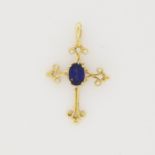 10K Gold & Sapphire Cross Pendant. Stamped '10K' on back of cross. Total Weight: 1 dwt / 1.5 g Size: