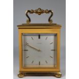 Bucherer, Gilt Bronze Carriage Clock. Dimensions: 9 x 5.75 x 4 in. Weight: 11 lbs - All clocks are
