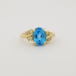 14K Gold Blue Topaz & Diamond Ring