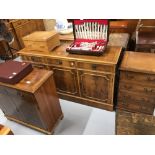 20th cent. Yew effect three door sideboard, music cabinet and cupboard. (3)