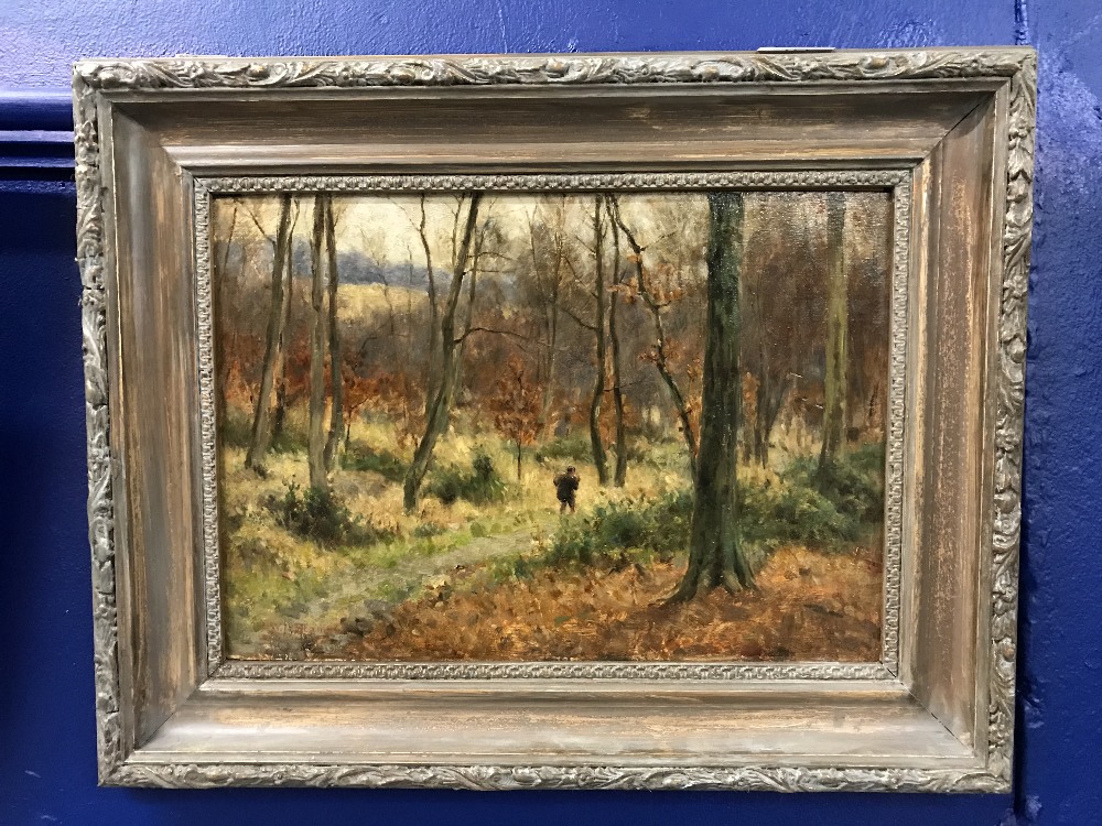 20th cent. W. J. Stamps: Oil on board. Man walking in wood. 14ins. x 10ins.