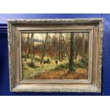 20th cent. W. J. Stamps: Oil on board. Man walking in wood. 14ins. x 10ins.