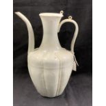 Chinese/Oriental Ceramics: A Chinese Qingbai porcelain ewer and cover, of baluster form with long