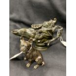 19th cent. Bronze novelty taper holder, Mr Punch holding a horses neck. Length 5ins. Plus a seated