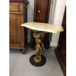 20th cent. Marble top side table. The single pedestal being a stylised cherub. 24ins.