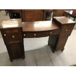 Early 19th cent. Double pedestal mahogany sideboard with bow front central section, brass lion