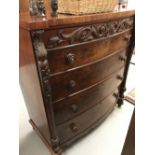 19th cent. Bow fronted mahogany four drawer chest of drawers with mother of pearl inlay handles.