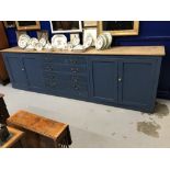 George III large pine Bath dresser. The centre with five drawers surrounded by a large cupboard each