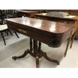 19th cent. Rosewood card table inlaid with ebony and decorated with a single brass moulding to the