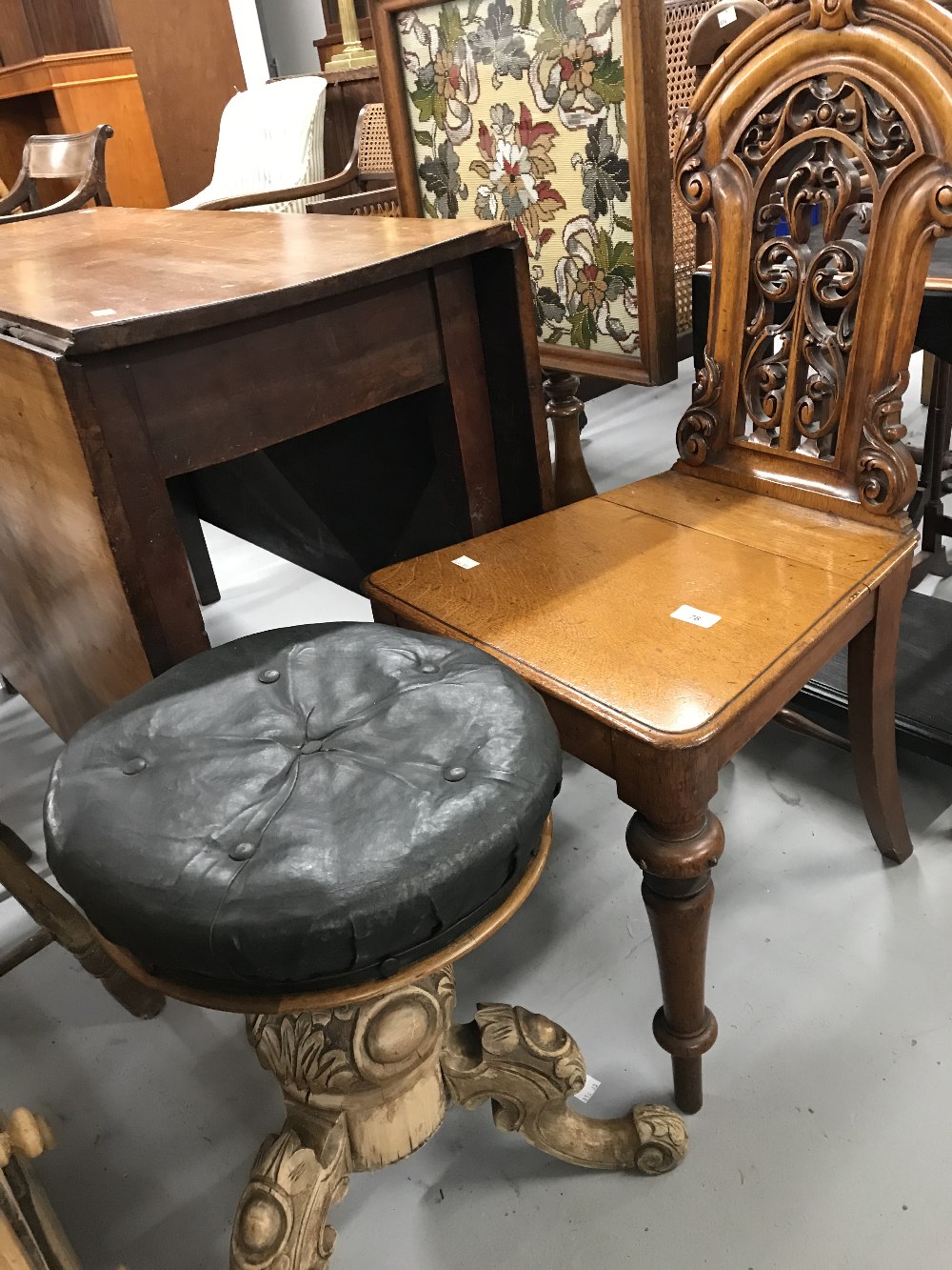 Early 20th cent. Gothic oak hall chair, plus a Victorian piano stool.