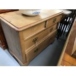 20th cent. Pine two over two chest of drawers, brass fittings. 40ins. x 18½ins. x 32ins.