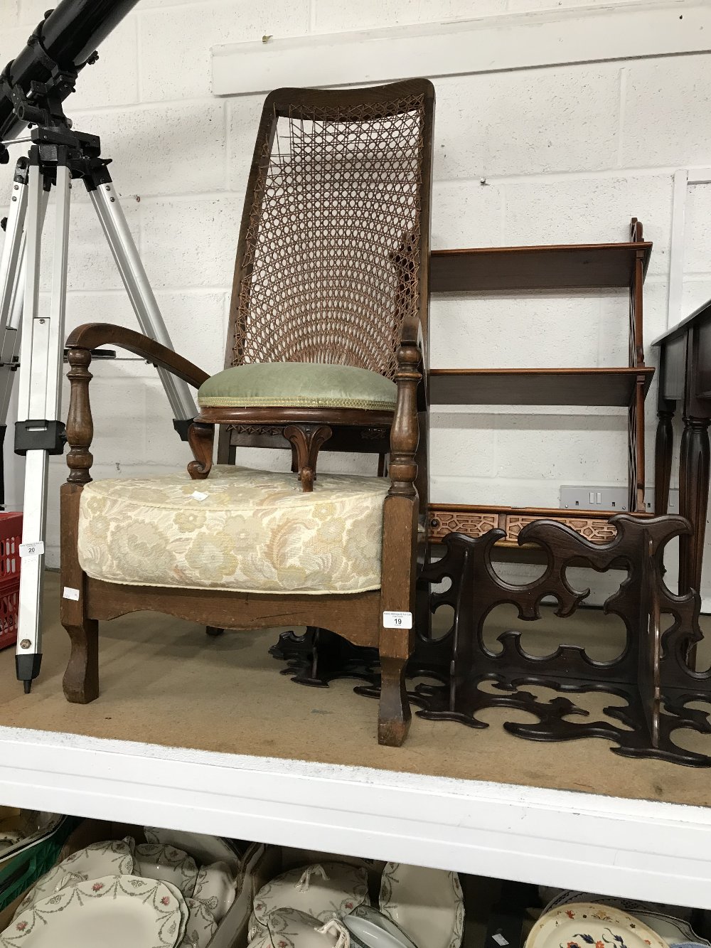 20th cent. Bergere low chair, footstool, a reproduction bookcase and 19th cent. Rosewood wall