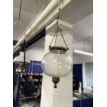 Lighting: Aesthetic ceiling candle lamp in globe form with white metal collar & base.