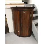 19th cent. Mahogany cylinder corner cupboard with shelves within.