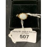 Yellow Metal Jewellery: Ring set with a single oval cut opal. Estimated weight 2.75ct. tests as