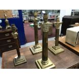 Lighting: Four 20th cent. brass table lamps in the form of composite columns, one marked Abbot on