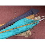 Fishing: 20th cent. Fishing rods including Norris Shakespeare, sea plus an umbrella and rest, and