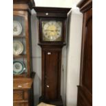 Clocks: 19th cent. Oak cased 30 hour longcase clock. Brass face signed John Lang Moreton. Silvered