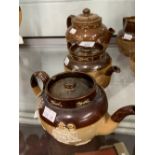 Doulton Lambeth: Harvest ware teapots, 2 pint, 7ins. 1 pint, and 1 pint (4¾ins) with replacement