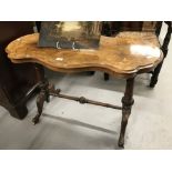 19th cent. Burr walnut topped hall table with foliate inlay on mahogany turned supports, and a
