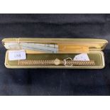 Watches: Ladies Rotary wristwatch with filigree faced bracelet, tests 9ct. 23.57g.