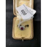 Jewellery: Ruby and diamond 18ct. ring, ruby 4mm 0.27ct and diamond 0.20pt's, 3.3g in total.
