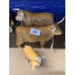 Beswick Cattle: Highland bull, cow and calf.