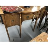 19th cent. Mahogany bow fronted serpentine sideboard with one central drawer flanked by two