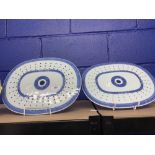 Ceramics: 19th cent. Chinese blue and white export meat oval drainer's - a pair. 13ins.