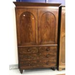 19th cent. Mahogany linen press with brushing slides, sitting upon two short and two long drawers.