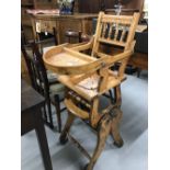 19th cent. Metamorphic oak children's high chair that converts to a 'rocking horse' at the touch