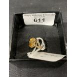 Hallmarked Jewellery: Ring set with an oval citrine. Hallmarked Birmingham. Weight 2.7g.